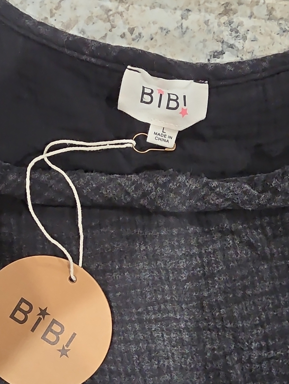 BiBi Black Eyelet Ruffle Peplum Top - Picture 5 of 5